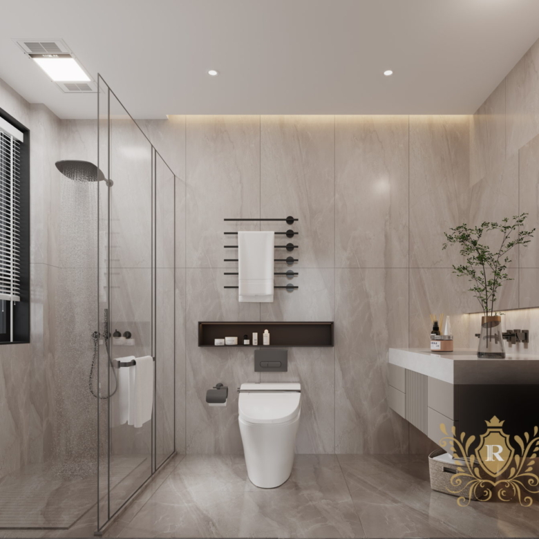 Elegant modern bathroom at Royal Legend Residence featuring a glass shower enclosure, floating vanity, contemporary toilet, and sophisticated marble-look finishes.
