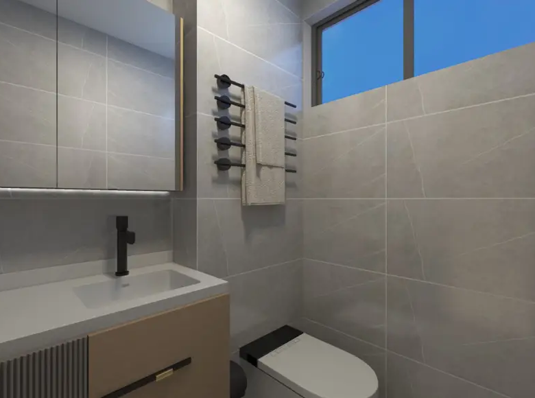 Modern compact bathroom at Adornhome Apartment Kileleshwa with marble sink and shower area