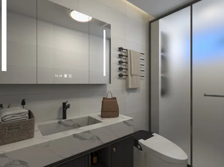 Luxury bathroom with marble countertop at Adornhome Apartment Kileleshwa featuring backlit mirror and modern fittings