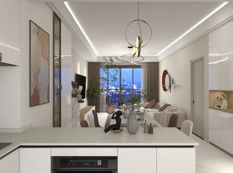 Modern kitchen with island at Adornhome Apartment Kileleshwa featuring white cabinets and city views
