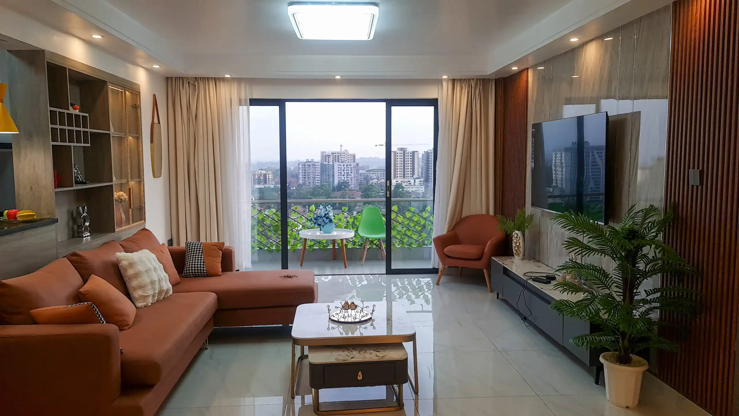 Furnished living room with balcony at Alina Harbour Kilimani