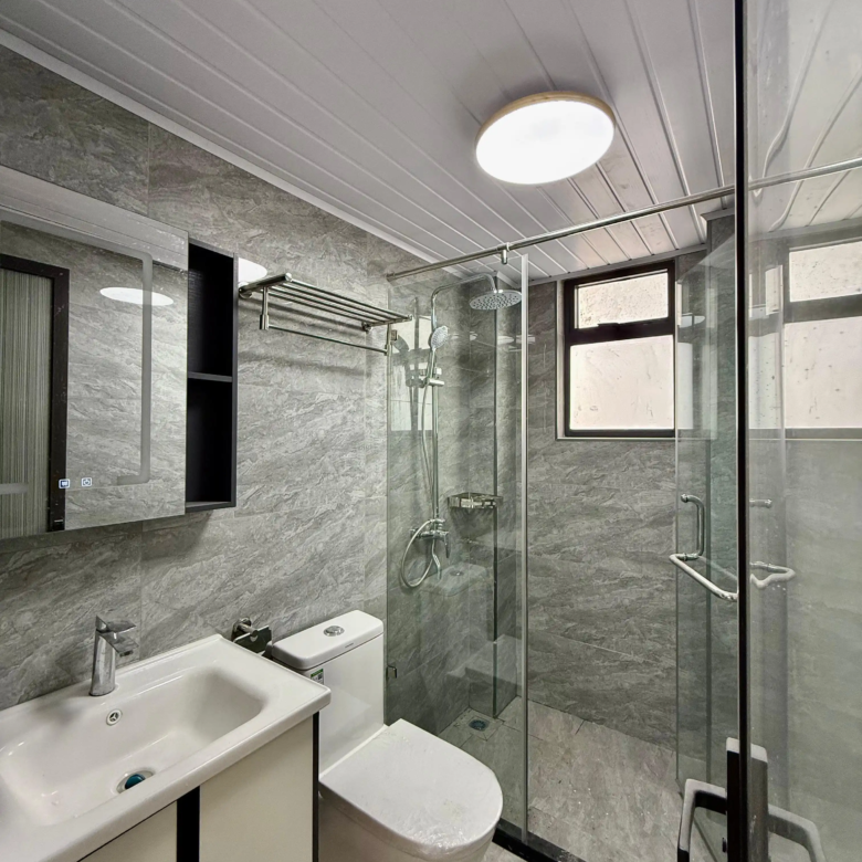 Modern bathroom with glass shower at Alina Harbour