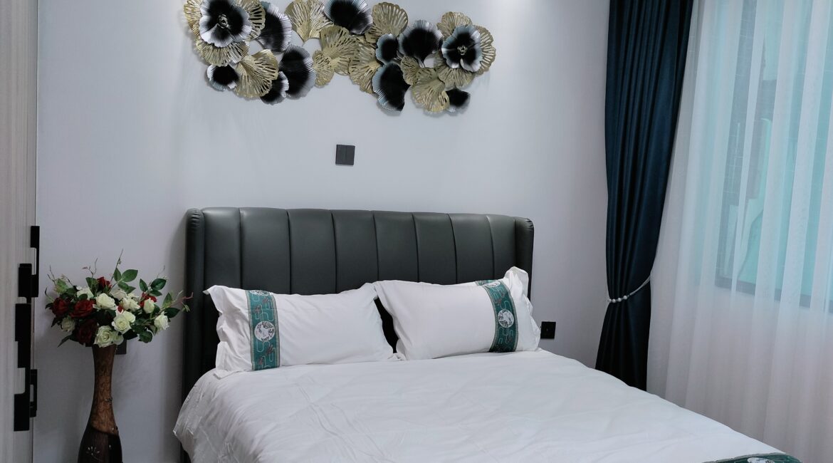 Bedroom at Alina Valley Apartments Kilimani with window and natural light