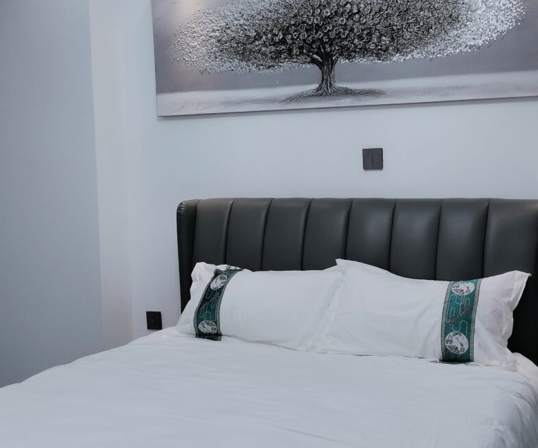 Ensuite bedroom at Alina Valley Apartments Kilimani with fitted wardrobe