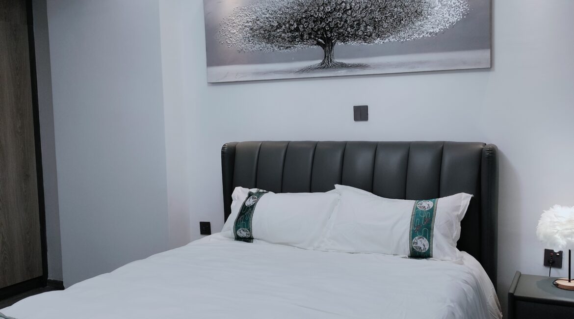 Ensuite bedroom at Alina Valley Apartments Kilimani with fitted wardrobe