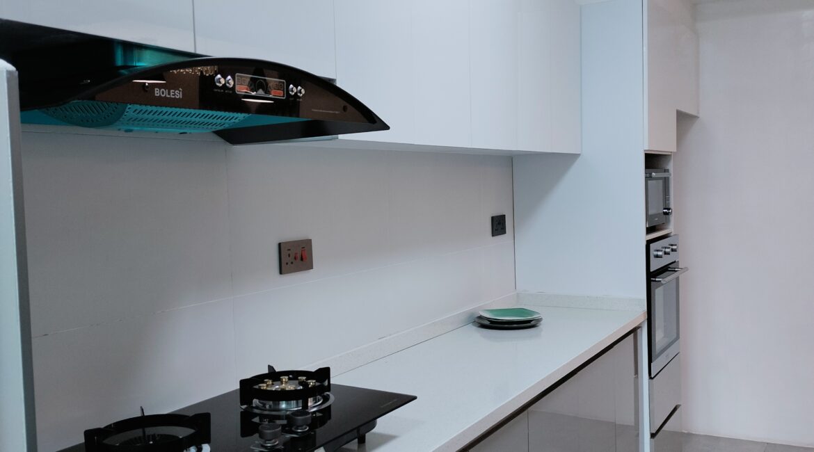 Fitted kitchen cooker and extractor at Alina Valley Apartments Kilimani