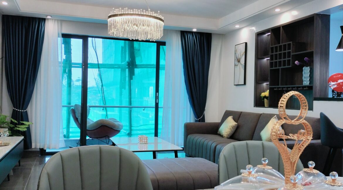 Living room at Alina Valley Apartments Kilimani with balcony access