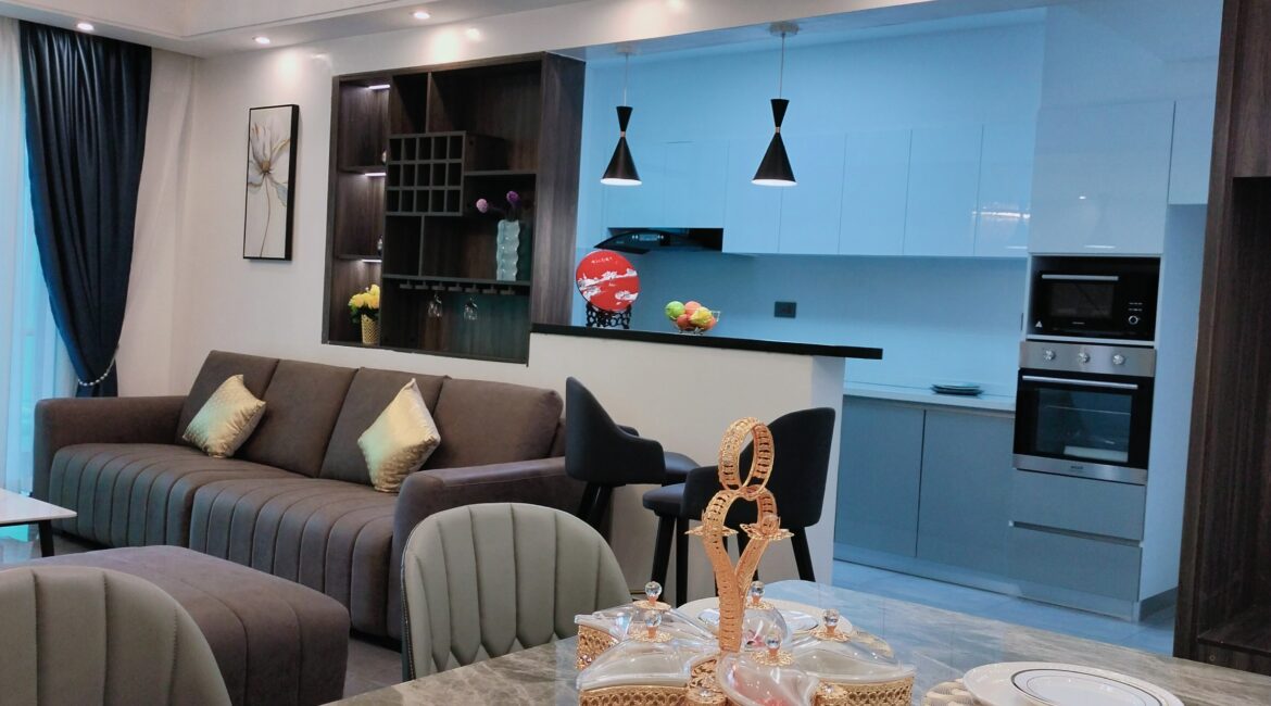 Open-plan lounge and kitchen at Alina Valley Apartments Kilimani