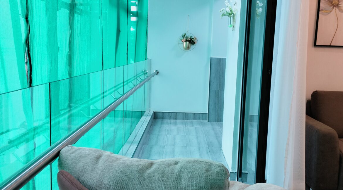 Private balcony at Alina Valley Apartments Kilimani with glass railing