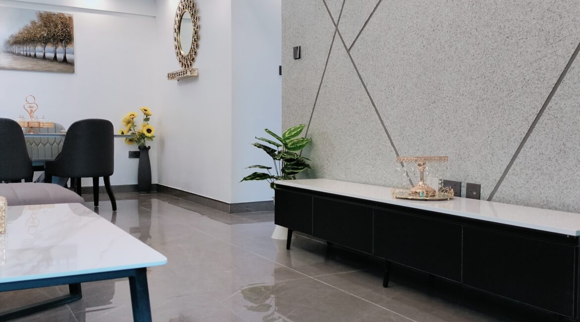 Modern TV wall and dining area at Alina Valley Apartments in Kilimani