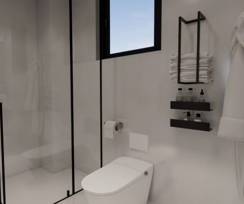 Modern bathroom with glass shower at Amber Bay Apartments Lavington