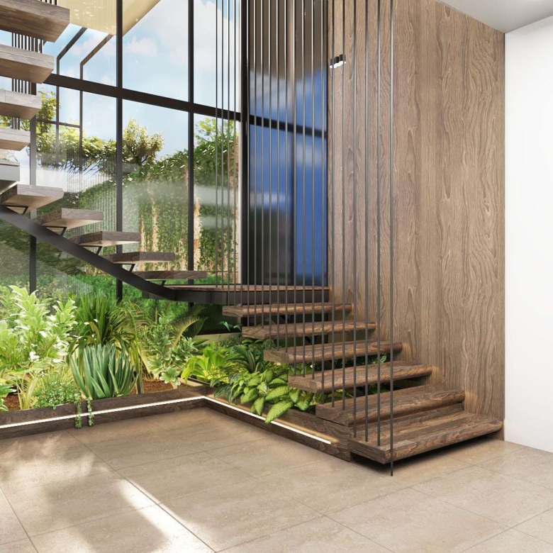 Indoor staircase at Aya Luxury Residences with landscaped garden feature
