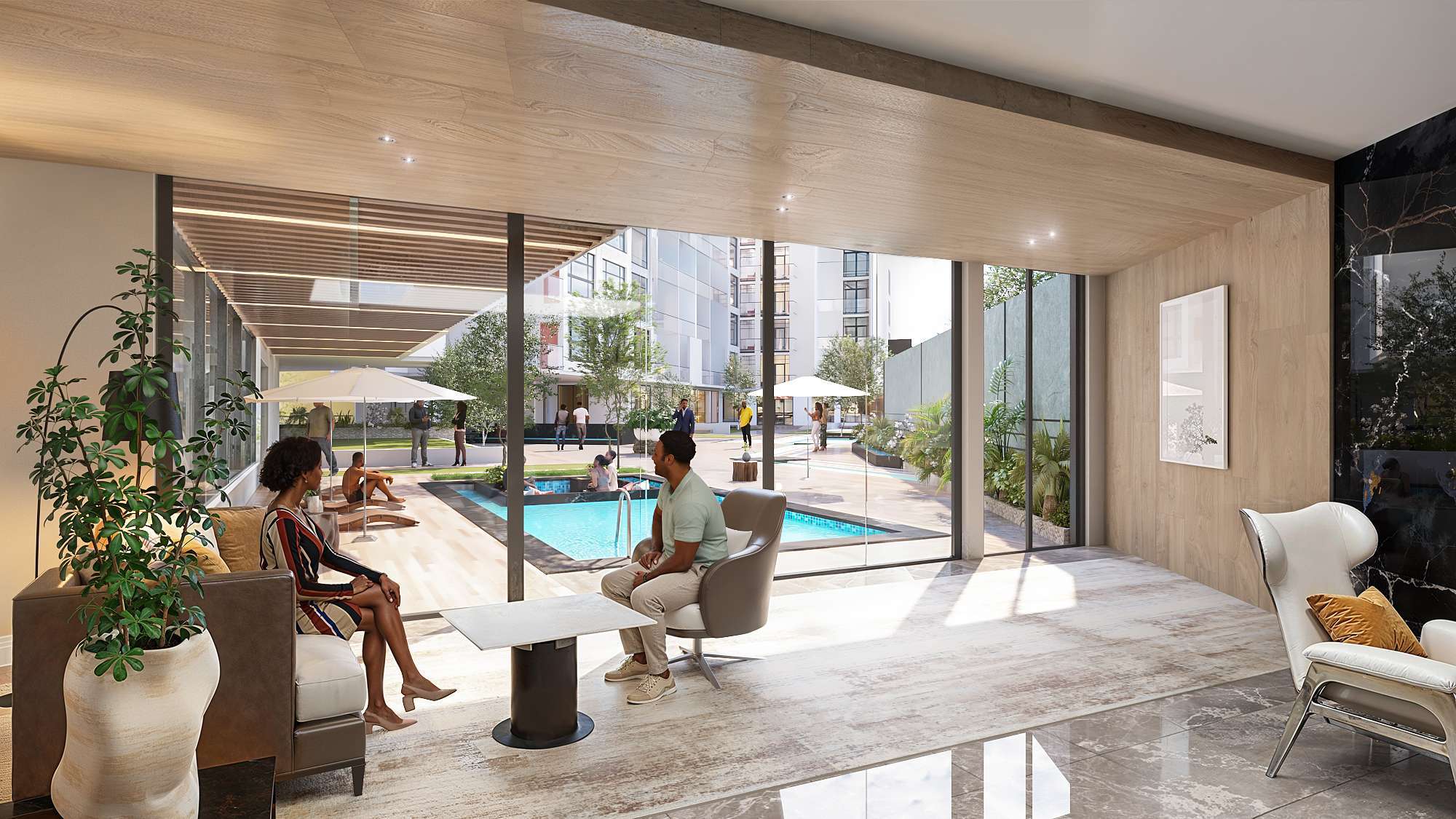 Resident lounge at Aya Luxury Residences with pool views and modern seating