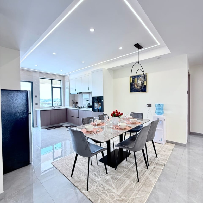 Bahari Homes Residency dining area with open kitchen in Kilimani