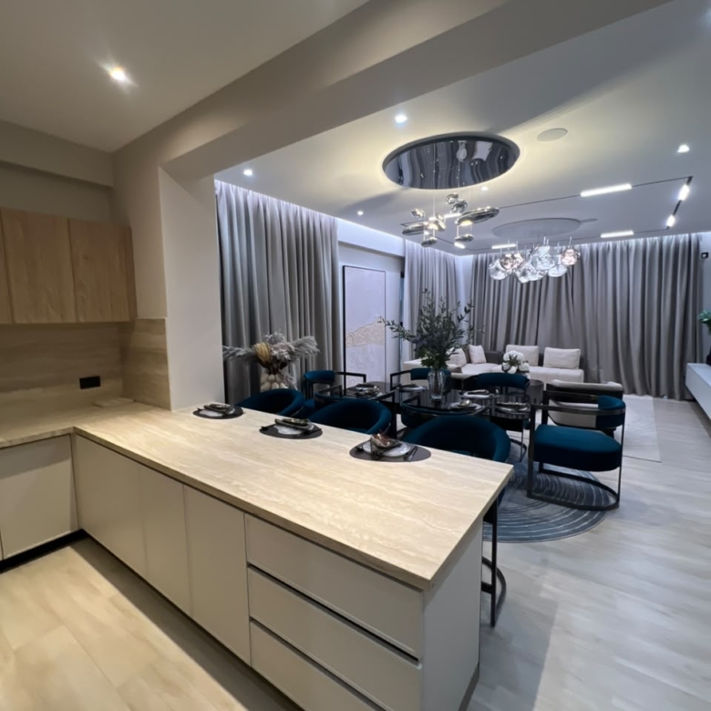 Kitchen island overlooking the dining and living area at Verona Apartments Westlands