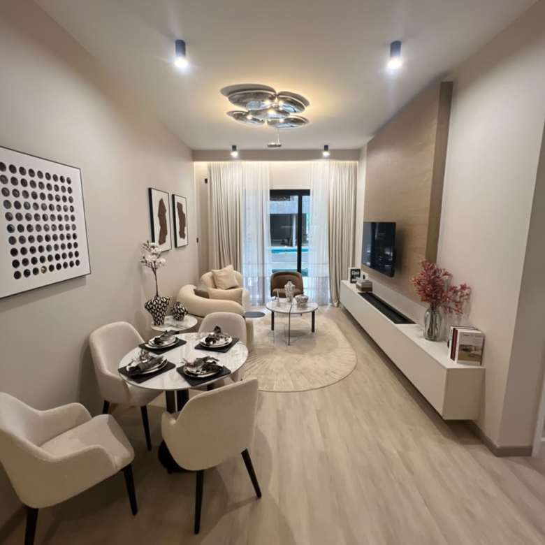 Open-plan lounge and dining area at Verona Apartments Westlands with modern furniture