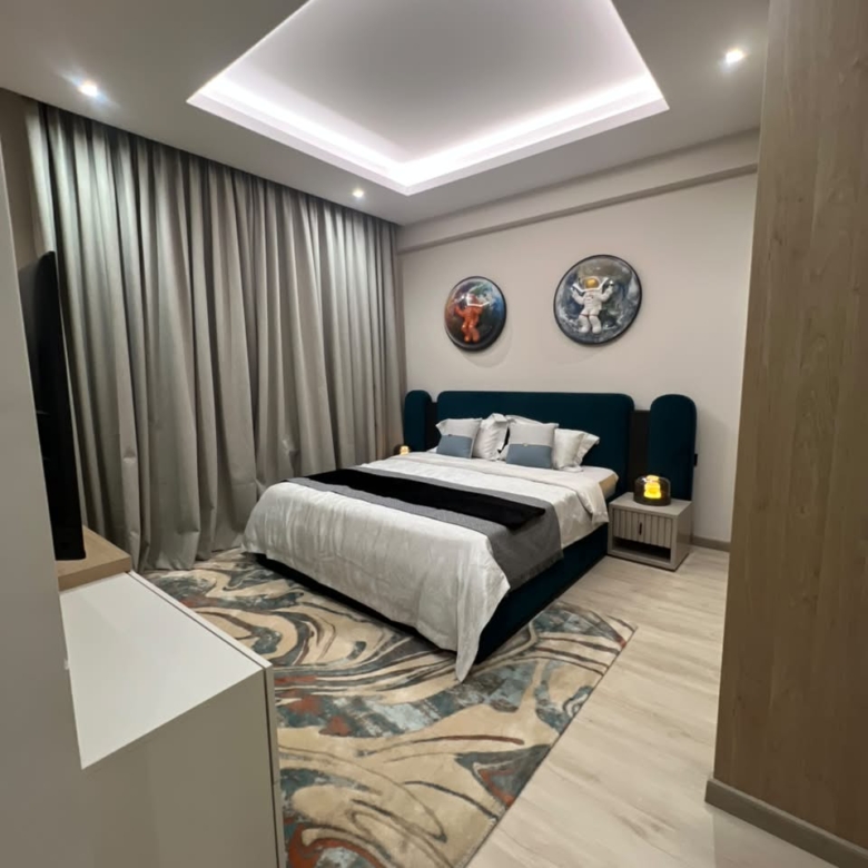 Spacious show apartment bedroom at Verona Apartments Westlands with modern ceiling lighting