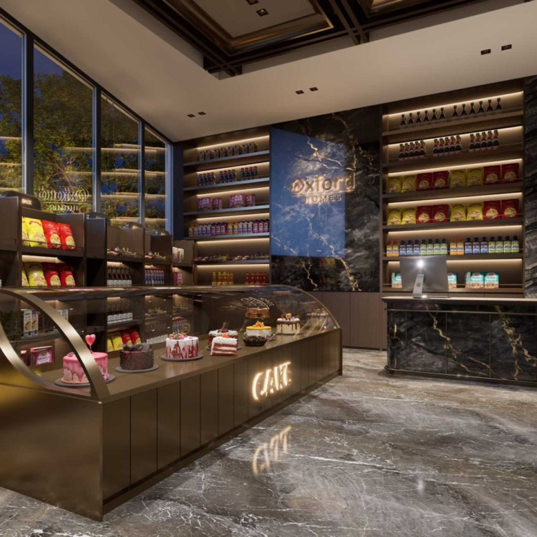 Oxford Homes Residency mini-mart rendering featuring stocked display shelves, glass cake counter, modern cashier desk, and illuminated interior finishes.