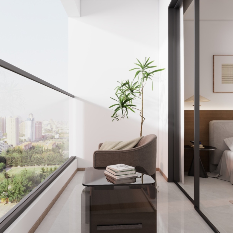 Oxford Homes Residency apartment balcony featuring glass railings, outdoor seating, a washing machine, and panoramic city views.