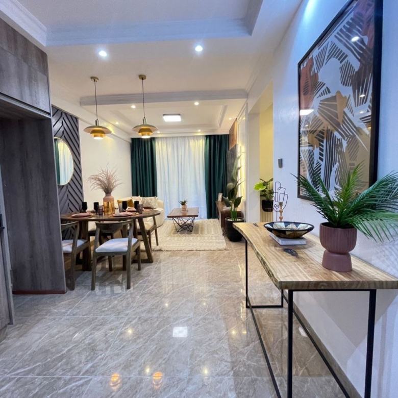 Apartment entrance leading to the furnished lounge at Padmore Residency