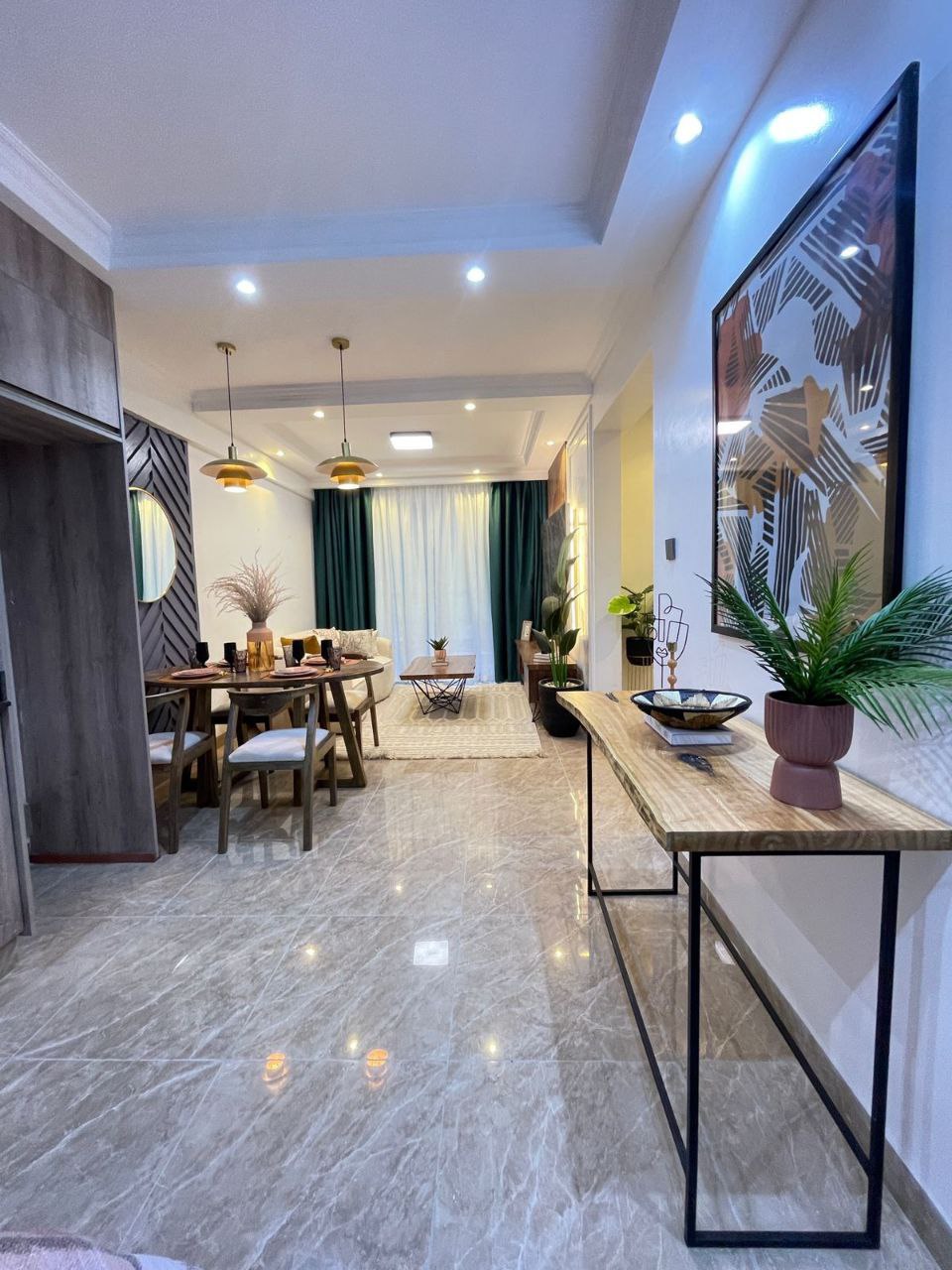 Apartment entrance leading to the furnished lounge at Padmore Residency