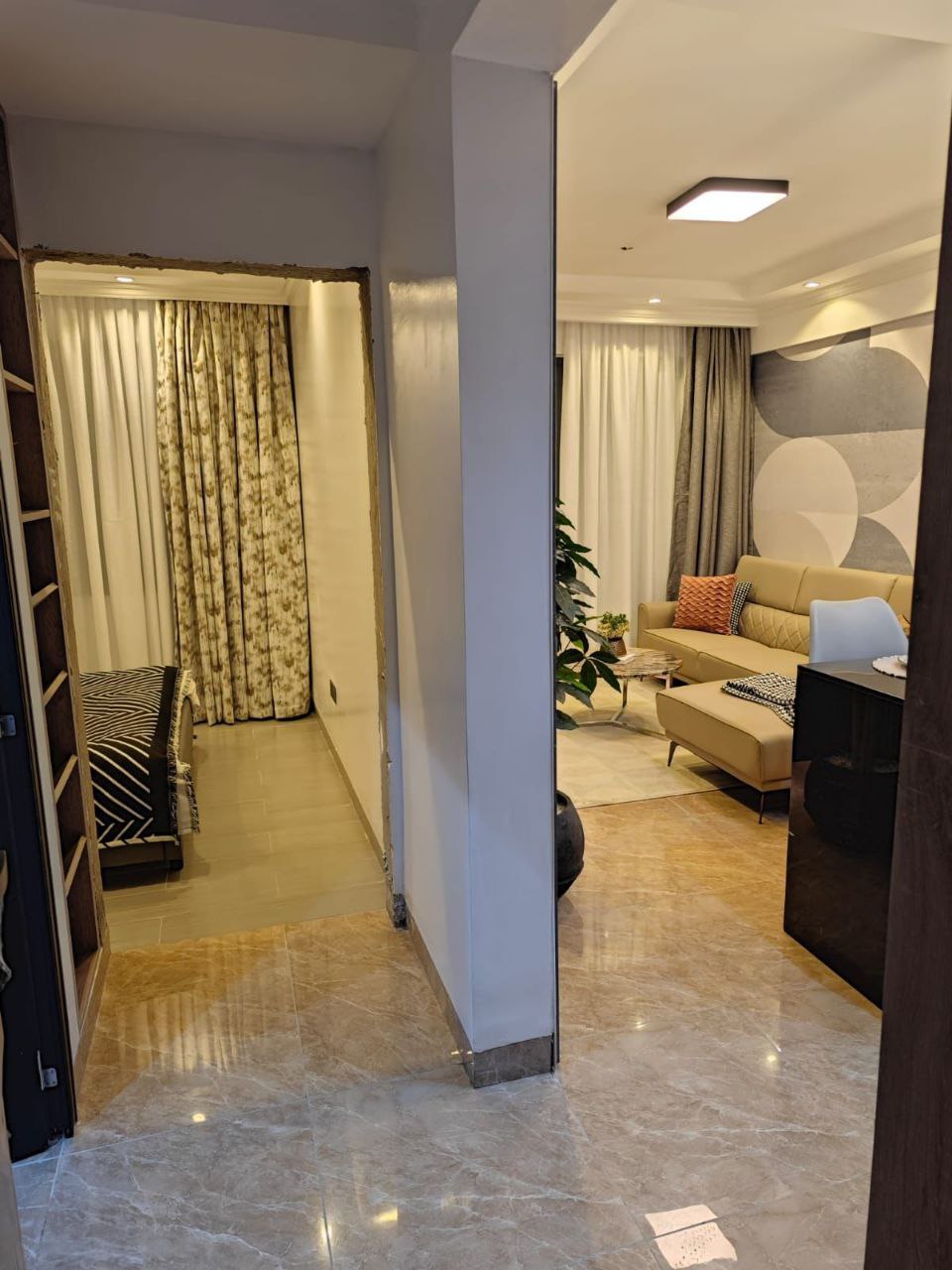 nterior hallway connecting the bedroom and lounge at Padmore Residency