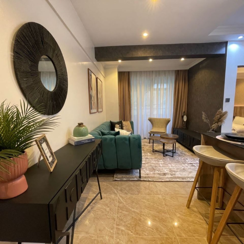 Furnished living room with breakfast bar at Padmore Residency Kilimani
