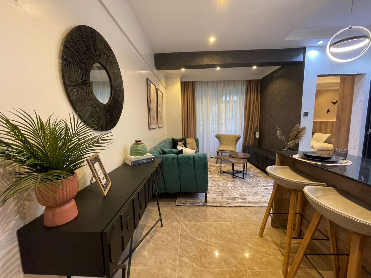 Furnished living room with breakfast bar at Padmore Residency Kilimani