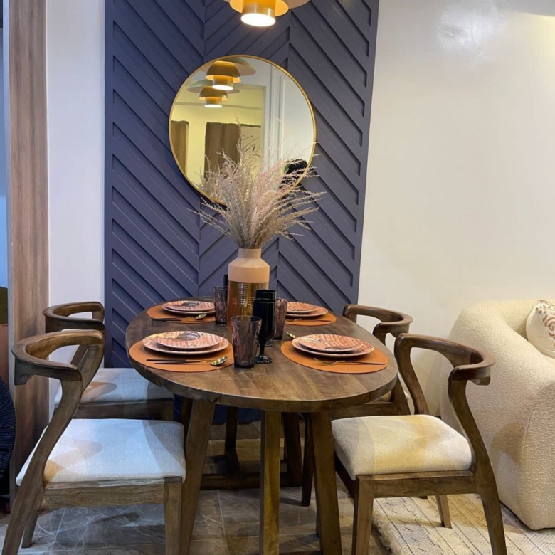 Six-seater dining area inside a furnished Padmore Residency apartment