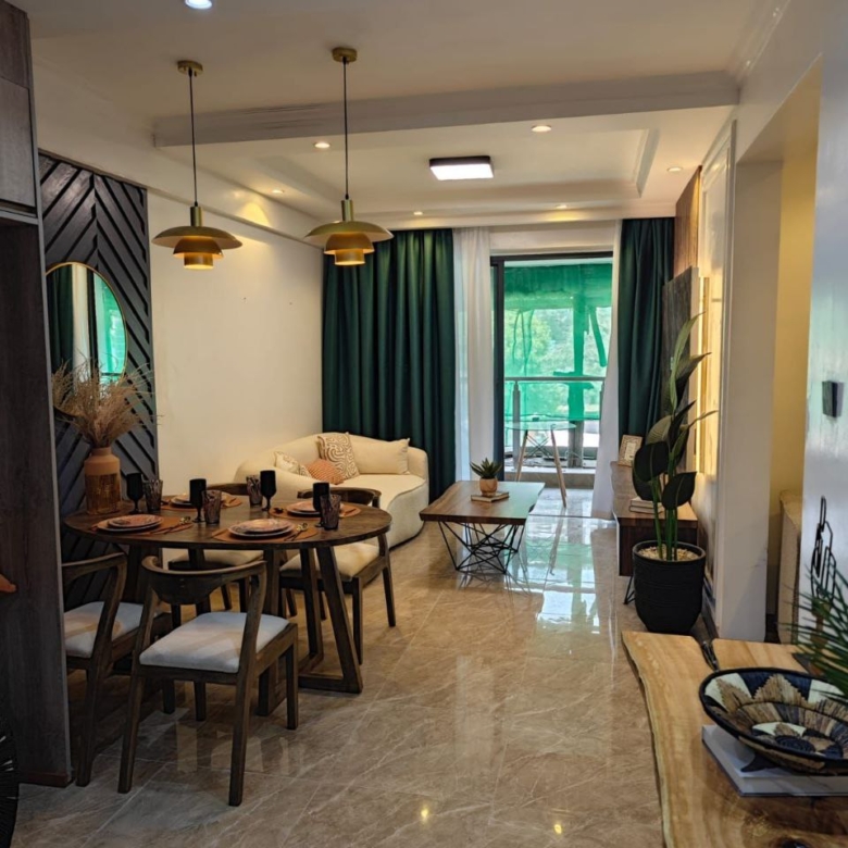 Furnished open-plan living and dining area at Padmore Residency Kilimani