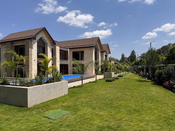 Exteranl image of the 5 bedroom villa for sale in Runda with lawn and swimming pool