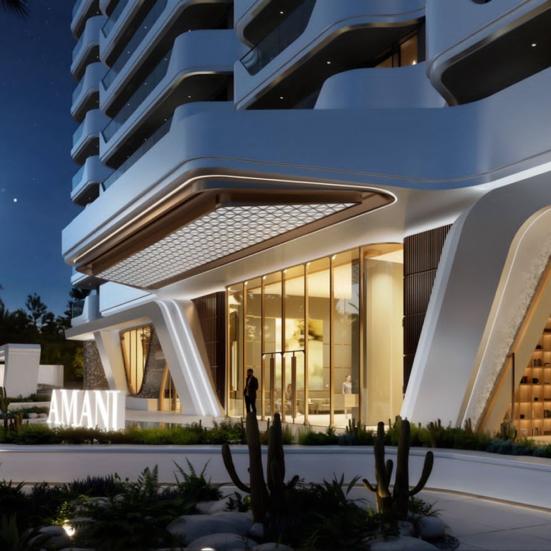 Amani Residence luxury main entrance at night featuring illuminated glass doors, curved architectural columns, landscaped gardens, and modern exterior lighting.