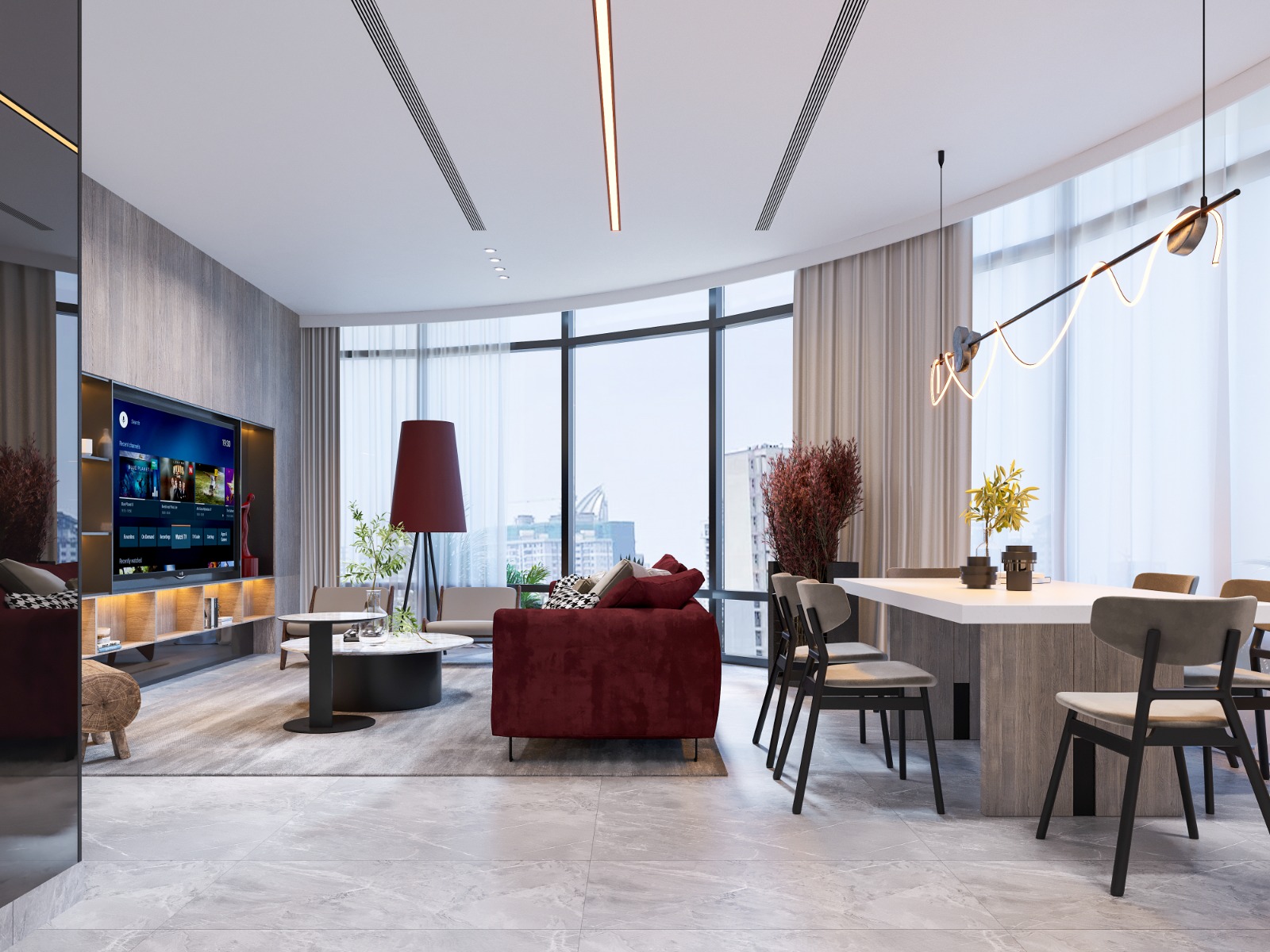 Fountain Residency spacious living and dining room featuring a burgundy sofa, modern dining table, floor-to-ceiling windows, contemporary lighting, and city views.