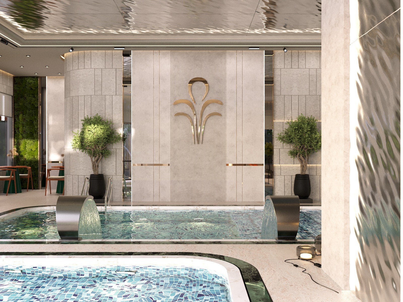 Fountain Residency indoor swimming pool featuring decorative fountain waterfalls, blue mosaic tiles, elegant wall detailing, landscaped plants, and contemporary architectural lighting.