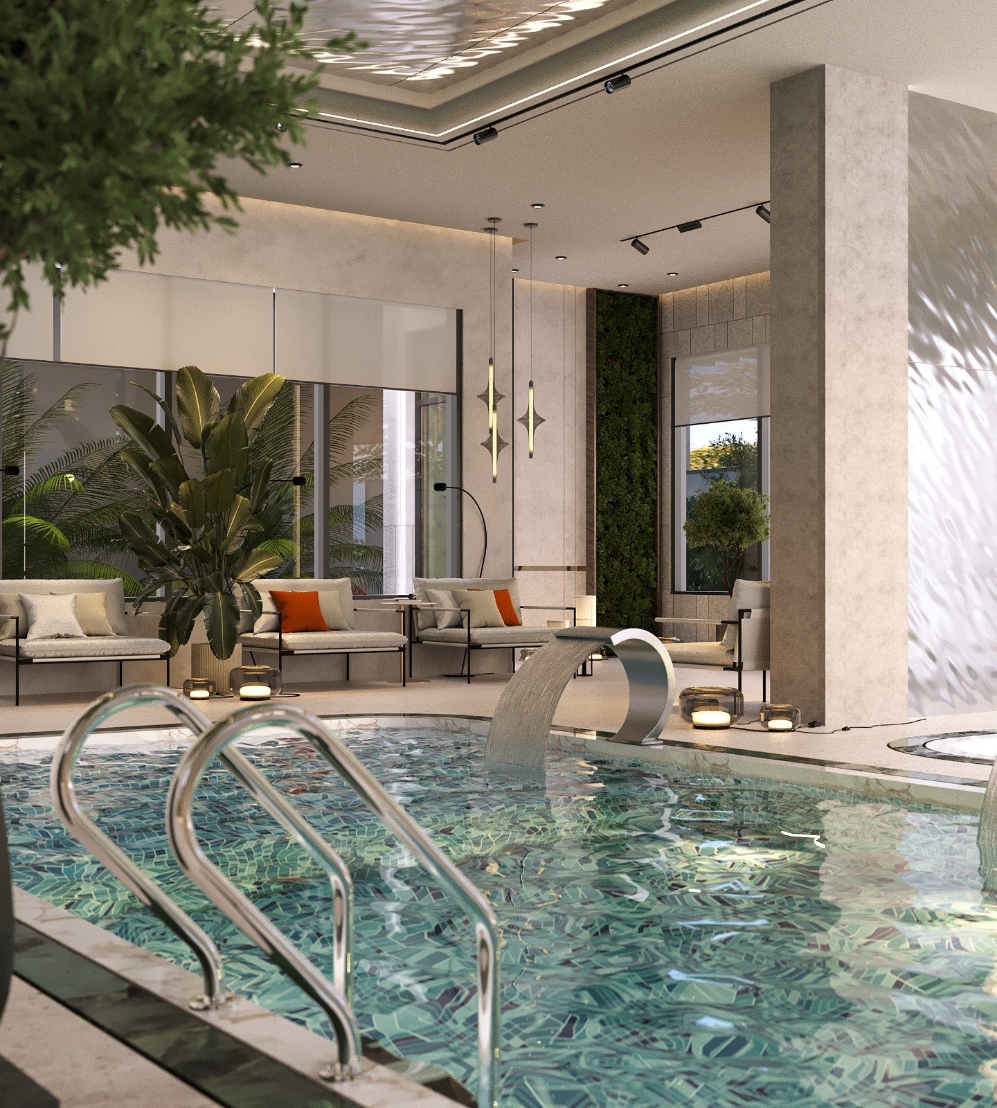 Fountain Residency indoor swimming pool featuring mosaic tiles, stainless steel pool ladder, decorative waterfall feature, modern lounge seating, and tropical plants.