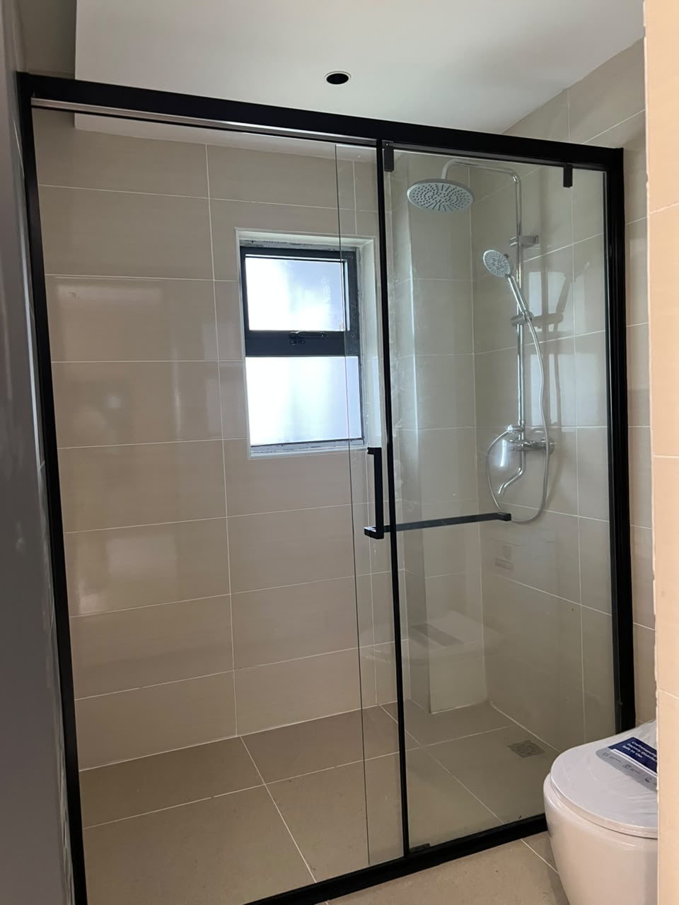 Shower cubicle at Golfscape Residences apartments in Kilimani