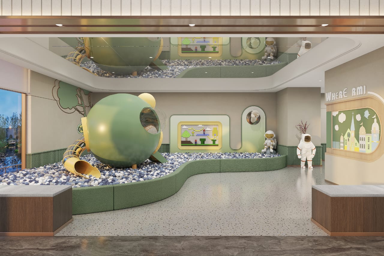 Golden Mansion Apartments indoor children's play area featuring a colourful ball pit, tube slides, interactive play structures, and a space-themed design.