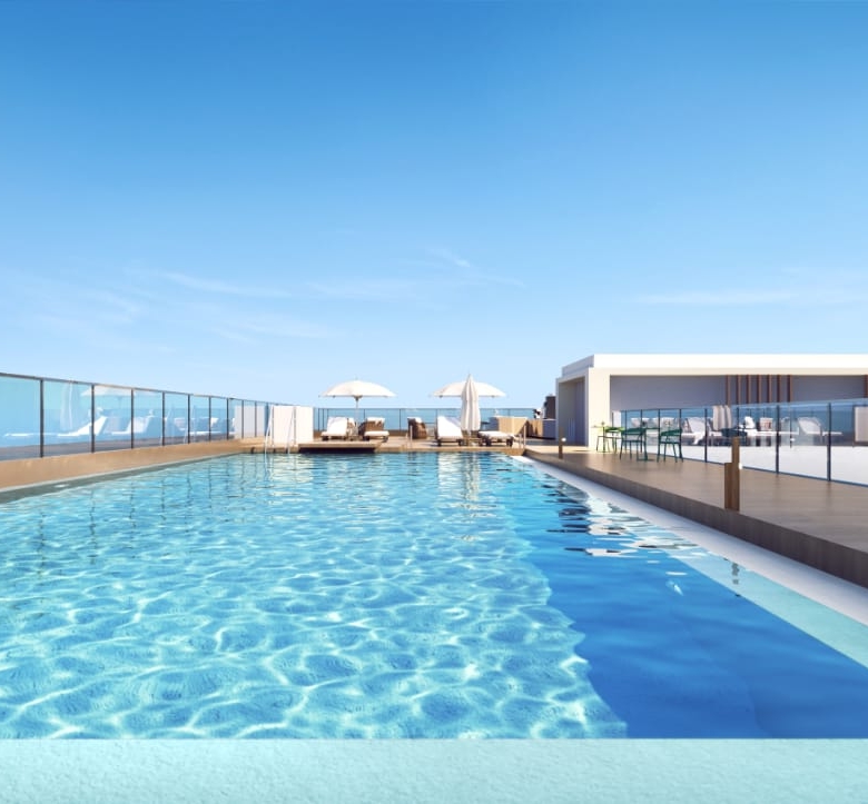 Golden Mansion Apartments rooftop swimming pool rendering featuring a large outdoor pool, glass safety railings, poolside loungers, parasols, and panoramic views.