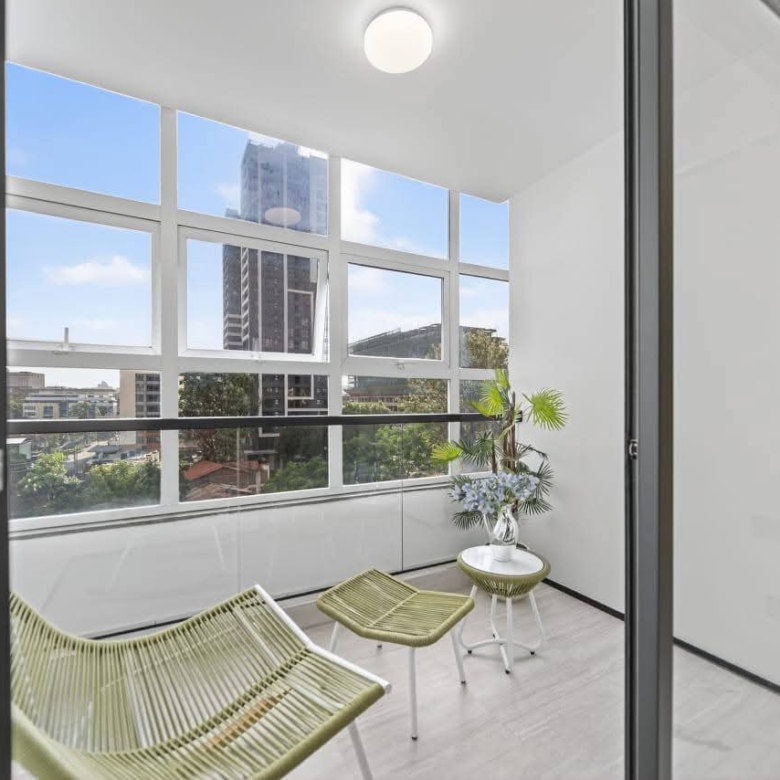 Enclosed balcony with urban views at Golden Mansion apartments in Westlands Nairobi