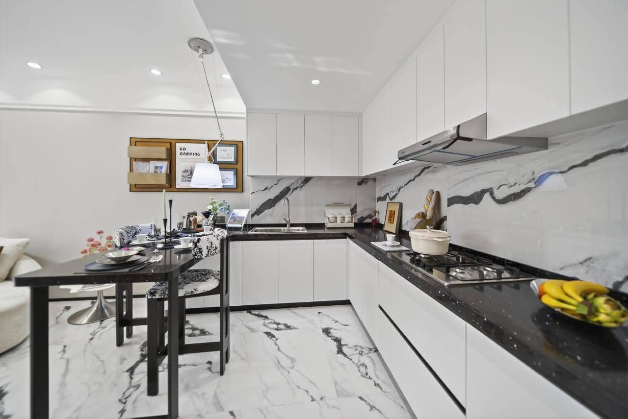 Open kitchen and dining area at Golden Mansion apartments in Westlands Nairobi