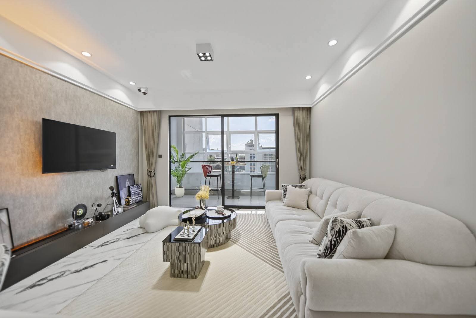 Living area with balcony access at Golden Mansion apartments for sale in Westlands