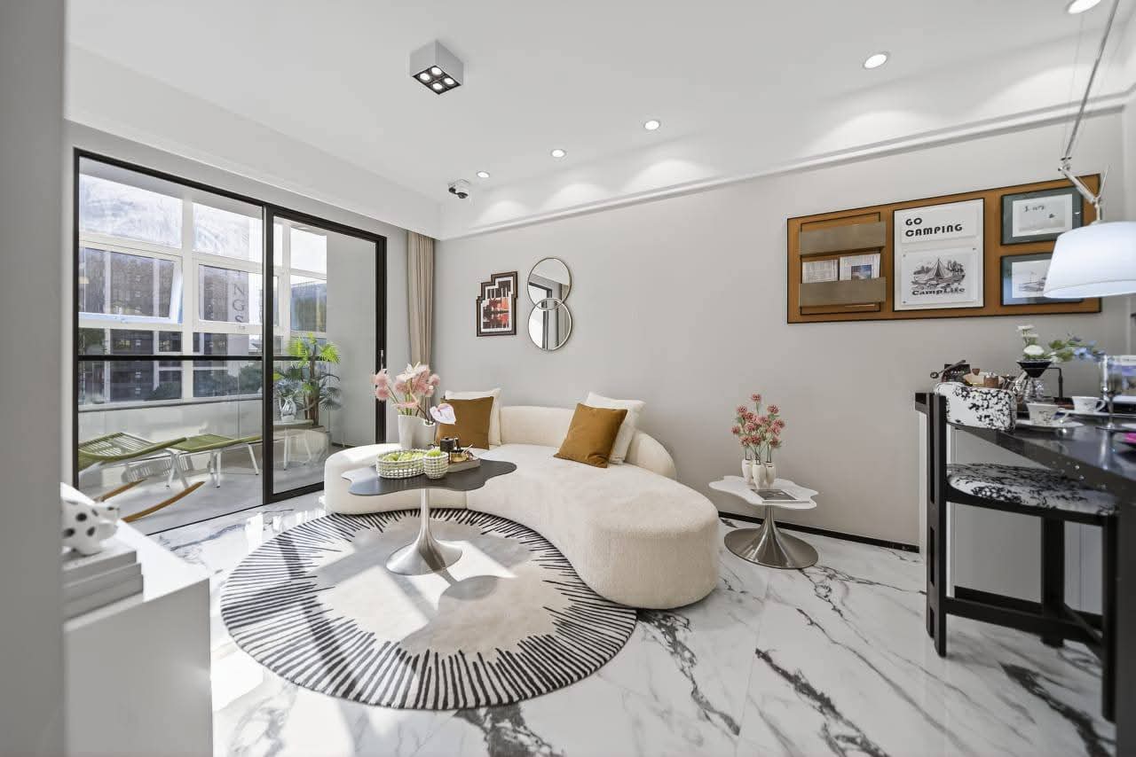 Styled apartment lounge with balcony access at Golden Mansion Westlands