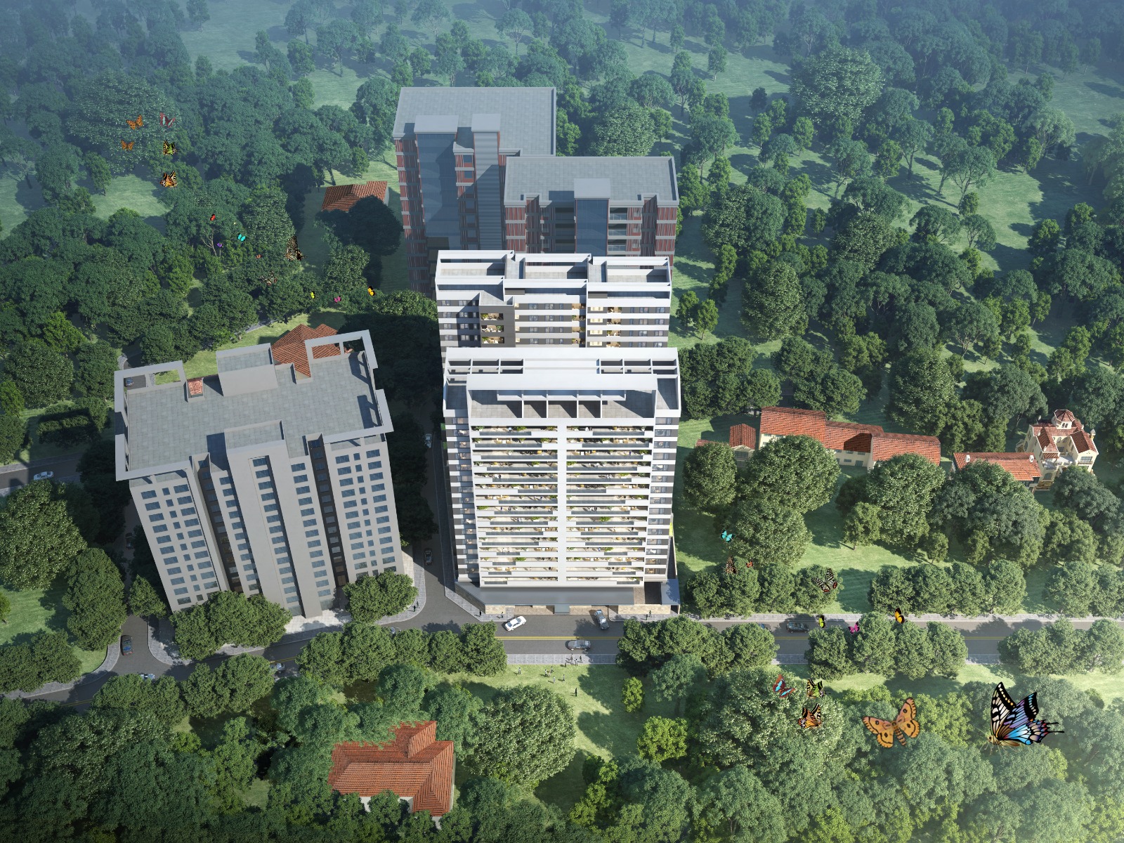 Butterfly Palace apartments aerial exterior view showing modern residential towers surrounded by greenery in Nairobi.
