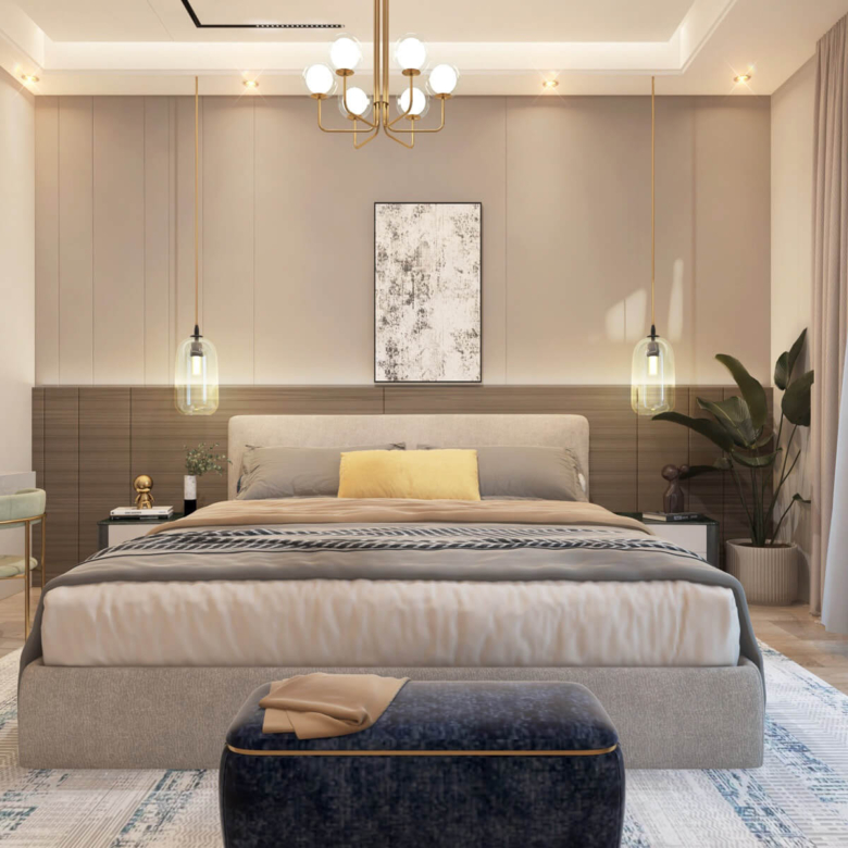 Black Olive Residency luxury master bedroom featuring elegant lighting, modern furnishings, decorative wall panels and a spacious bed.