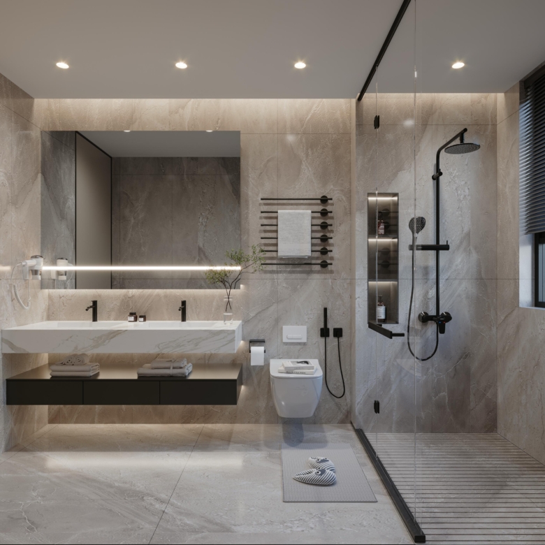 Brookside One Residency luxury bathroom featuring double vanity sinks, glass-enclosed rainfall shower, modern toilet and elegant marble-effect finishes.