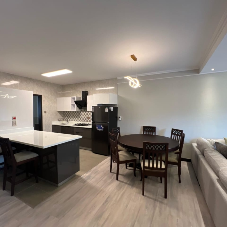 Dining and living area at Pearl Rivers Riverside apartment