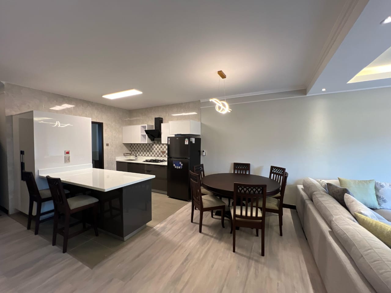 Dining and living area at Pearl Rivers Riverside apartment