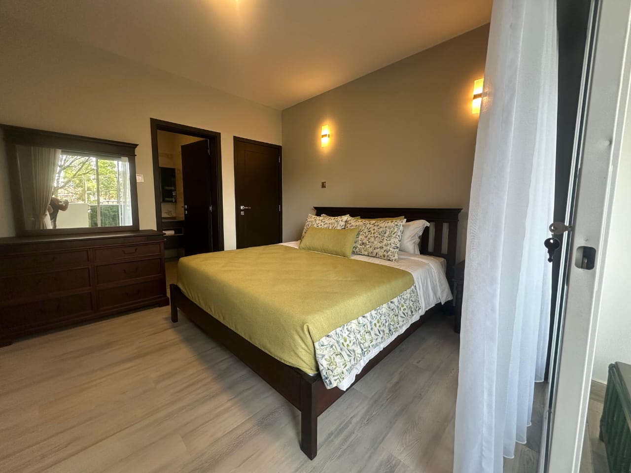 Spacious balcony overlooking greenery at Pearl Rivers Riverside