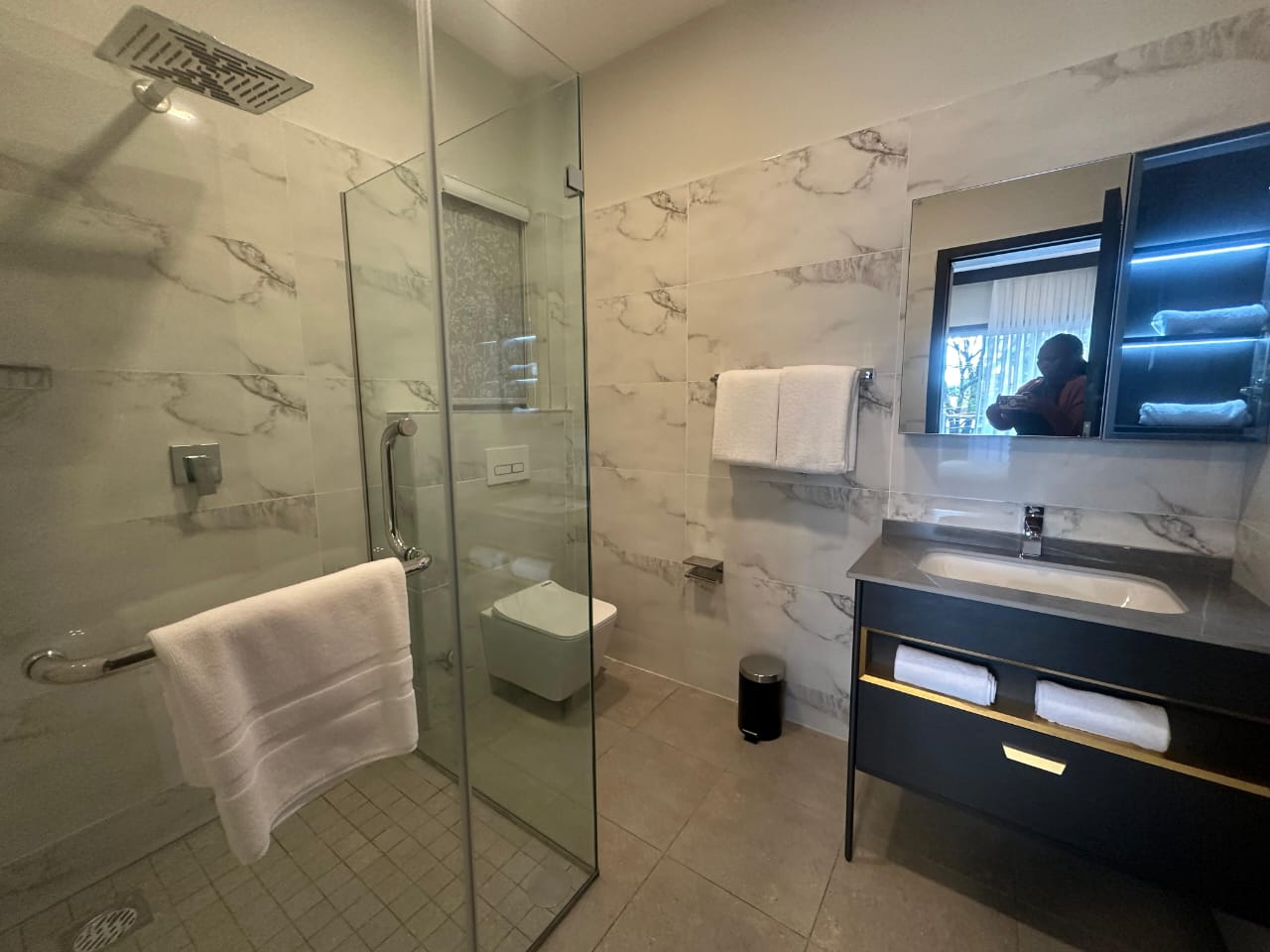 Bedroom with balcony access at Pearl Rivers Riverside Nairobi