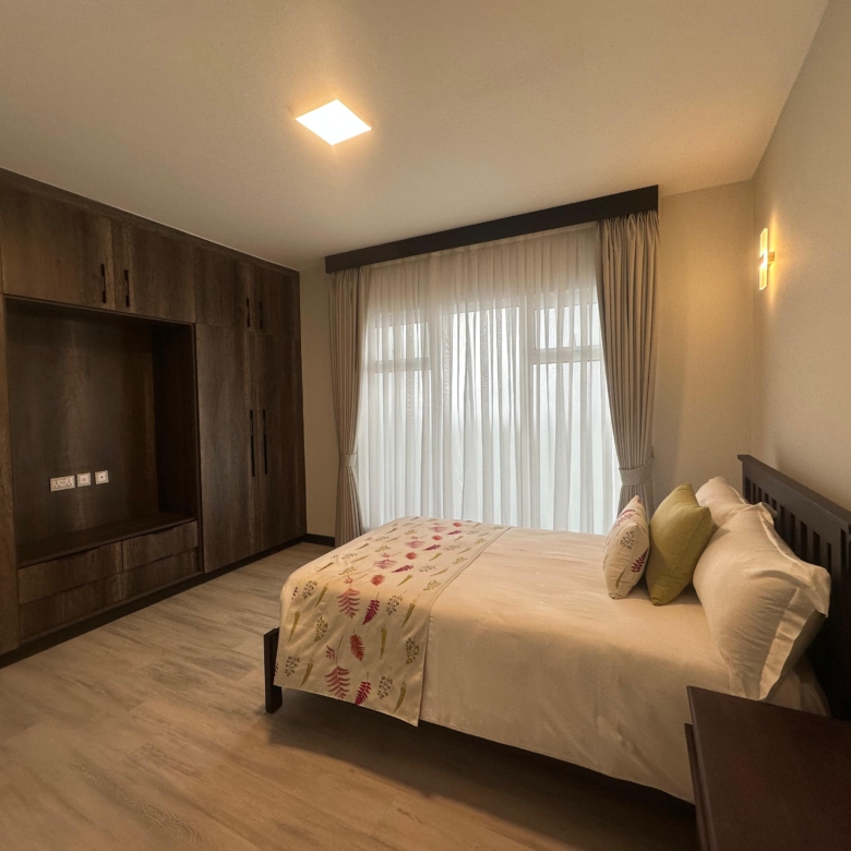 Modern bathroom with glass shower at Pearl Rivers Riverside
